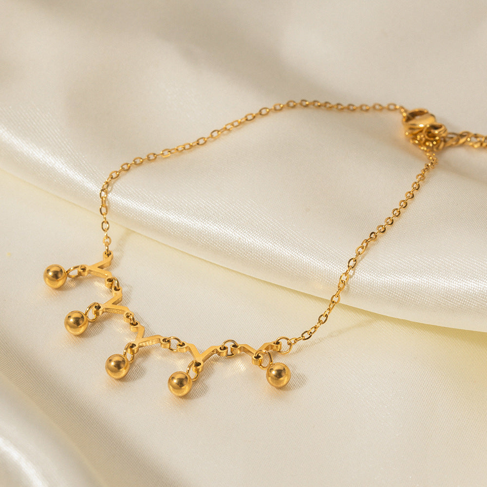 Women's Fashion Y-shaped Small Golden Balls Titanium Steel Anklet